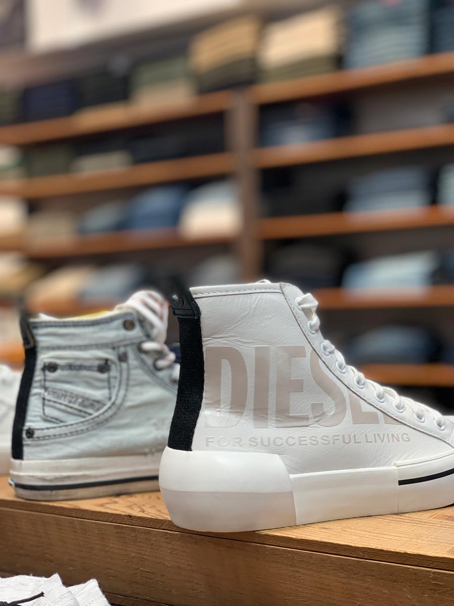 Front: Diesel Dese S-Dese MC Sneaker Star White/Iridescent (RRP $369) back: Diesel Magnete Exposure IV W Sneaker Indigo (RRP $379) encompass 2